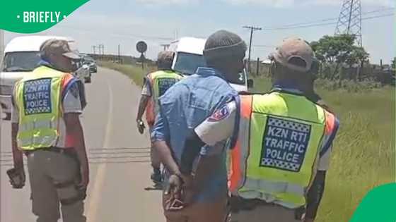 Taxi driver arrested after dramatic foot escape during road safety operation