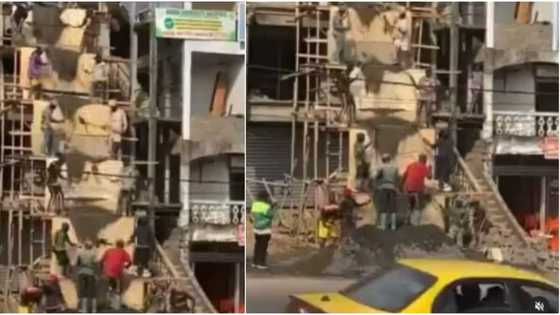 Workers have fun, sing as they shovel cement to upper floor of 2-storey building