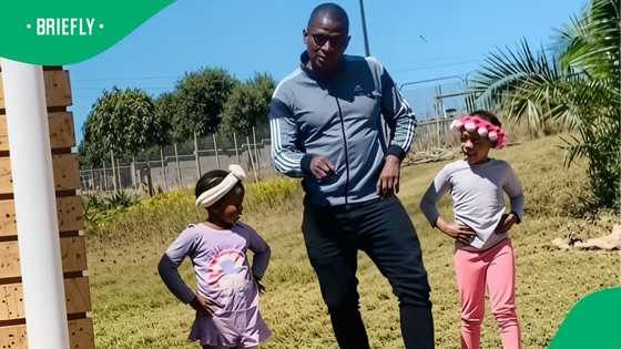 Uncle demonstrates model walk for nieces as practice for their pageant in TikTok video